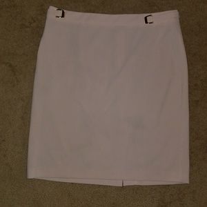 Perfect pencil skirt. Soft pink with buckles